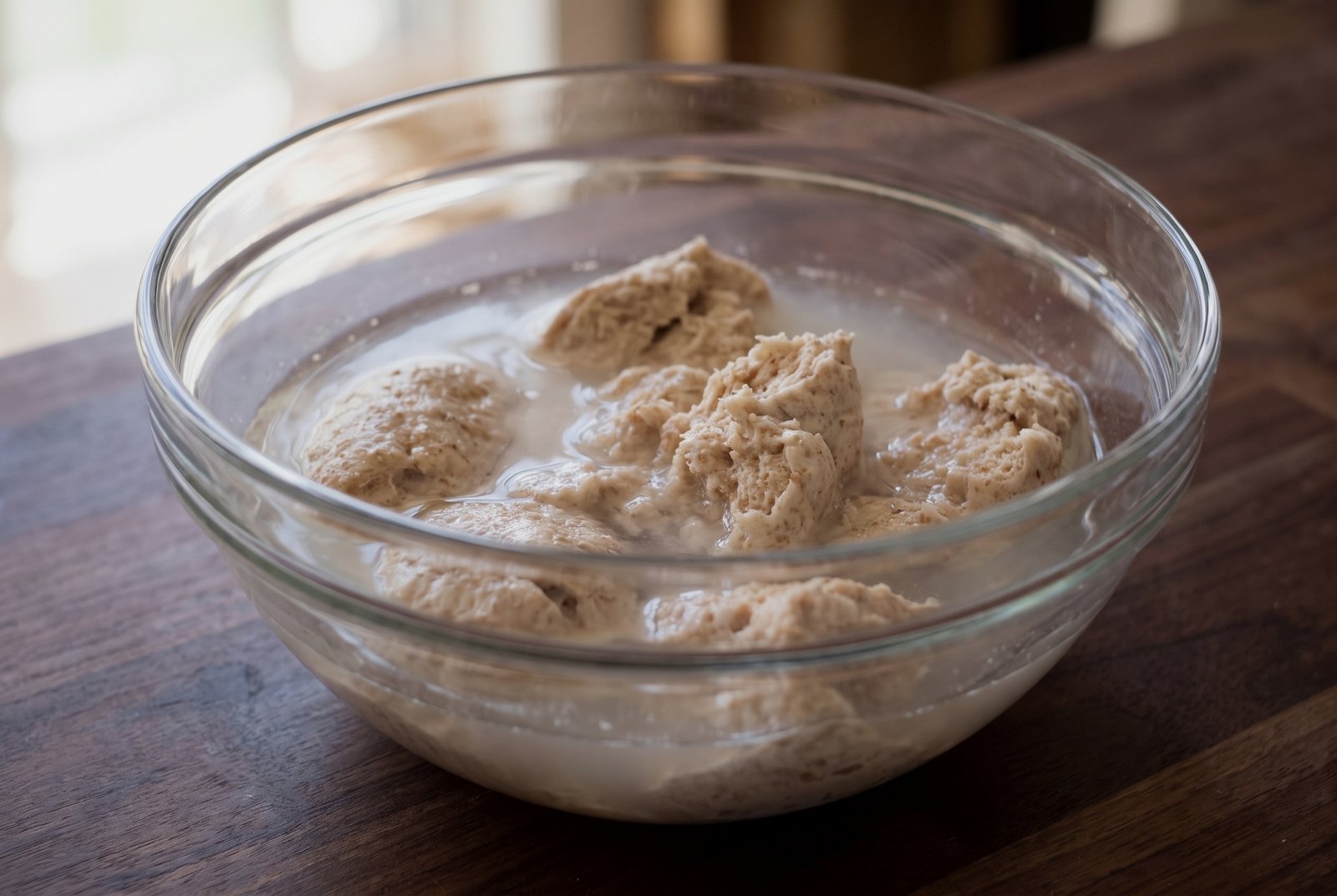 Stiff starter pieces dissolving in recipe water before flour is added